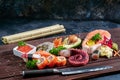 Sushi Set. Different sashimi, sushi and rolls with octopus