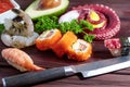 Sushi Set. Different sashimi, sushi and rolls with octopus Royalty Free Stock Photo