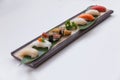 Sushi Set : Maguro, Hamachi, Salmon, Tai, Grilled Foie Gras, Grilled Unagi, Squid and Hatate. Royalty Free Stock Photo