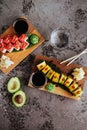 Sushi Set nigiri and sushi rolls with tea served on gray stone slate Royalty Free Stock Photo