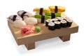 Sushi set and sushi roll on wooden board