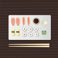 Sushi set salmon maki roll, sashimi with wasabi, soya sauce, chopsticks. Japanese rice healthy diet meal on plate. Vector Royalty Free Stock Photo