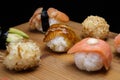 Sushi Set sashimi and rolls served on wooden desk Royalty Free Stock Photo