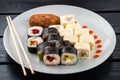 Sushi roll set in restaurant served in white plate Japan cuisine Royalty Free Stock Photo