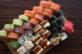 Sushi Set. Top view of assorted sushi on wooden background. Typical japanese food Royalty Free Stock Photo