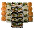 Sushi set on a white background, isolate, top view. Sushi rolls with sesame, unagi sauce, chicken and green vegetables Royalty Free Stock Photo