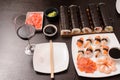 Set of sushi with empty plate and glass of wine Royalty Free Stock Photo