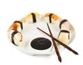 Sushi with soy sauce on a plate