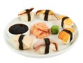 Sushi with soy sauce on a plate