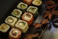 Sushi and sushi rolls, sushi nigiri on stone plate on dark background Royalty Free Stock Photo