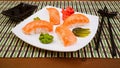 Sushi syake on white square plate Royalty Free Stock Photo