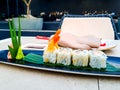 Tempura prawn sushi rolls on a table in a restaurant