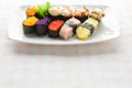 Sushi on white plate, tuna, salmon, sea bass, sweet egg, shrimp sushi Royalty Free Stock Photo