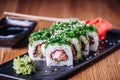 Sushi on a Wooden Table in Restaurant, Delicious Japanese Food, Sushi Rolls Royalty Free Stock Photo