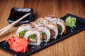 Sushi on a Wooden Table in Restaurant, Delicious Japanese Food, Sushi Rolls Royalty Free Stock Photo