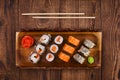 Sushi on wooden table, top view Royalty Free Stock Photo