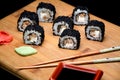 Sushi zuko maki with shrimp, cheese, cucumber and black masago caviar. Royalty Free Stock Photo