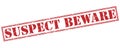 Suspect beware red stamp Royalty Free Stock Photo
