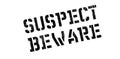 Suspect Beware rubber stamp Royalty Free Stock Photo