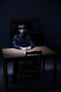 Suspect man in interrogation room Royalty Free Stock Photo