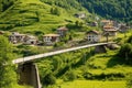 suspended bridges connecting houses in a hilly hamlet