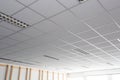 Suspended ceiling with LED square lamps sin the office Royalty Free Stock Photo