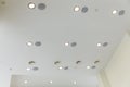 Suspended ceiling and plasterboard with built-in lights in the decoration of the apartment or house Royalty Free Stock Photo