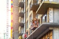 Suspended construction craddle near wall of hightower residentaial building with glass metal modern facade construction Royalty Free Stock Photo