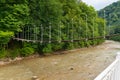 Suspended footbridge over the River Kurdzhips Royalty Free Stock Photo