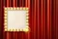 Suspended gold frame on the red curtain Royalty Free Stock Photo