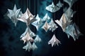 suspended origami shapes in a gentle dance