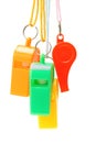 Suspended plastic whistles Royalty Free Stock Photo