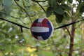 Suspended volleyball ball used by volleyball players in training.