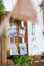 Suspended wood pallet and crates decorated with rope and wedding photos