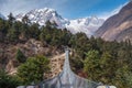 Suspenion bridge in Manaslu circuit trekking route, Himalayas mountain range in Nepal Royalty Free Stock Photo