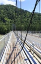 Suspension bridge across mountain river Katun. Altai. Royalty Free Stock Photo