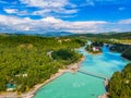 Suspension bridge Blue Katun river Altai mountains republic Russia, aerial top view Royalty Free Stock Photo