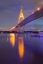 Suspension bridge cross over Bangkok city river night Royalty Free Stock Photo