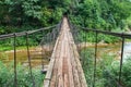 Suspension bridge, Crossing the river, ferriage in the woods, Royalty Free Stock Photo