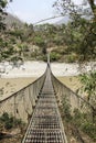 Suspension bridge Himalayas Nepal Royalty Free Stock Photo