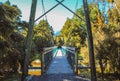 Suspension bridge at Lake Matheson, South Island, New Zealand Royalty Free Stock Photo