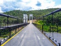 The suspension bridge is made of white steel