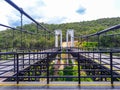 The suspension bridge is made of white steel