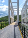 The suspension bridge is made of white steel