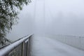 Suspension bridge in the morning mist, Salzburg, Austria