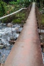 Suspension bridge over Caldera river near Boquete Panama , on Lost Waterfalls hiking trai Royalty Free Stock Photo