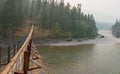 Suspension Bridge over Flathead River at the Spotted Bear Ranger Station / Campground in Montana USA Royalty Free Stock Photo