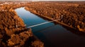 Suspension bridge over the river. aerial photography from a drone Royalty Free Stock Photo