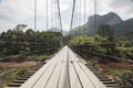 Suspension bridge over the river in Ratchaprapa Dam, Surat Than Royalty Free Stock Photo