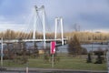 Suspension bridge over the river and the road. Royalty Free Stock Photo